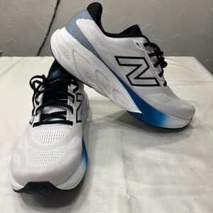 New Balance Men's Athletic Shoes in White and Black with Blue Accents
